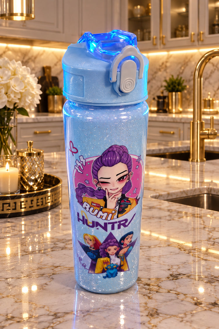 Children's water bottle with cartoon character design on a reflective surface.