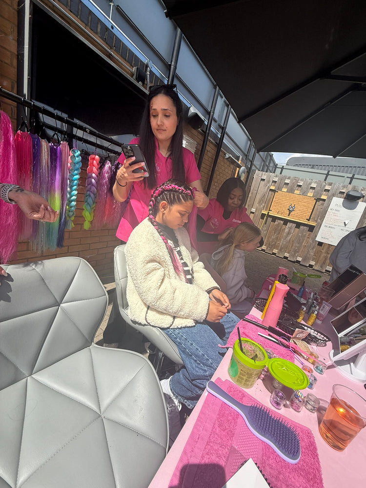 Glitter braids by The Glitter Braid Bar at the Tom Parker charity event at Bromley Football Club
