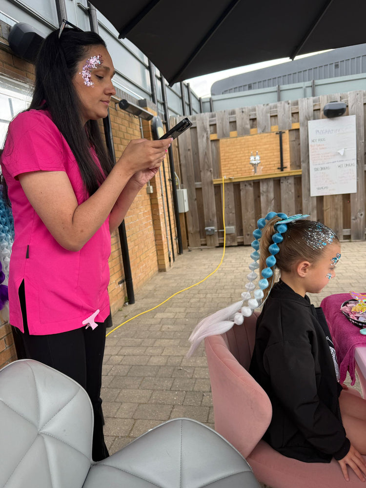 Glitter braids by The Glitter Braid Bar at the Tom Parker charity event at Bromley Football Club