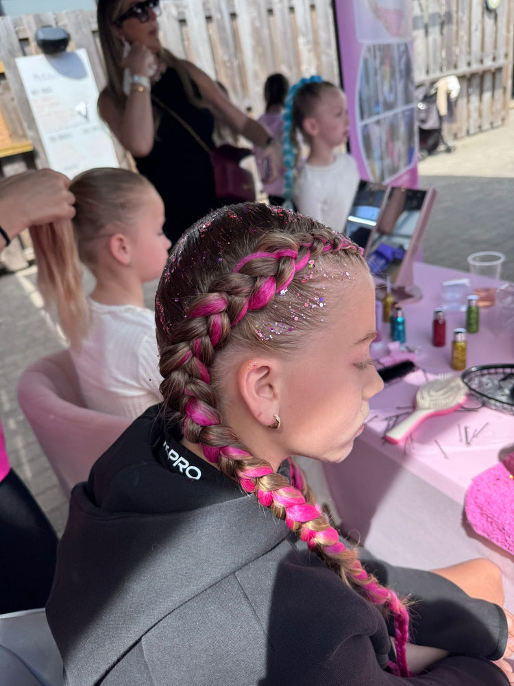 Glitter braids by The Glitter Braid Bar at the Tom Parker charity event at Bromley Football Club