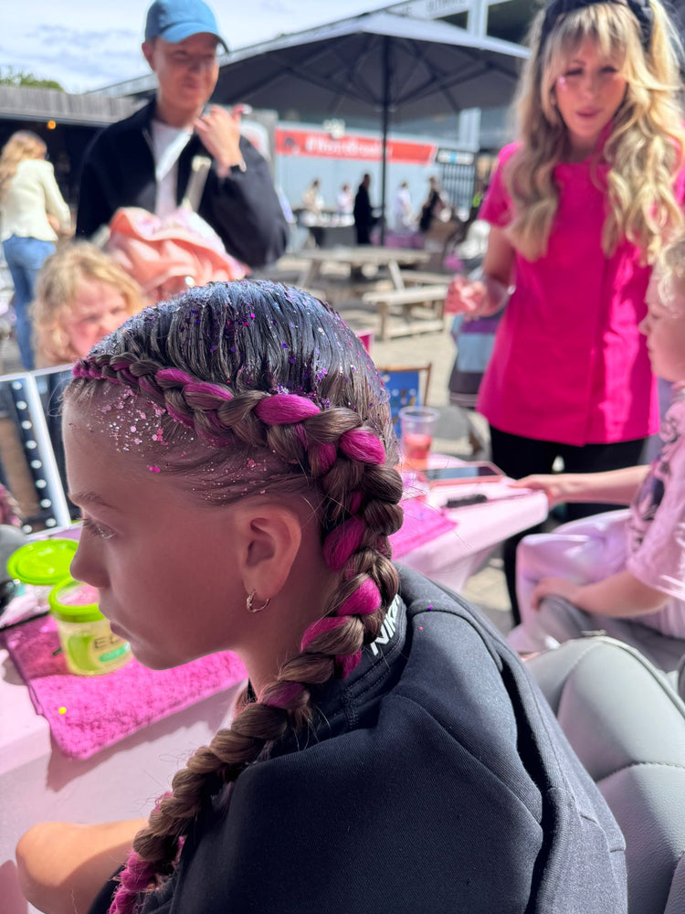 Glitter braids by The Glitter Braid Bar at the Tom Parker charity event at Bromley Football Club