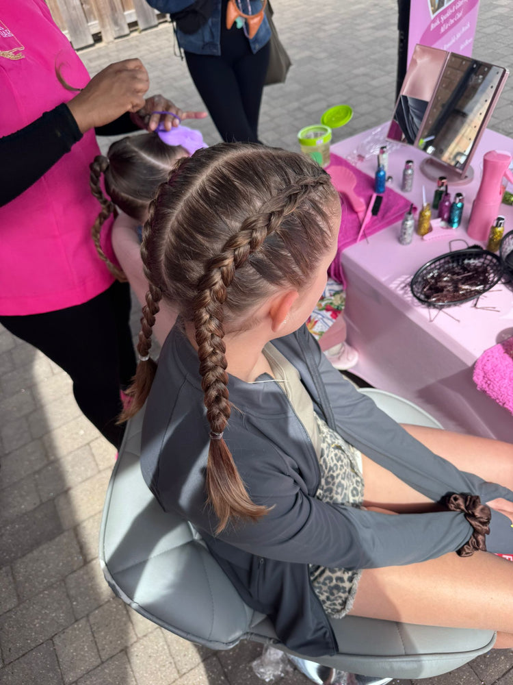 Glitter braids by The Glitter Braid Bar at the Tom Parker charity event at Bromley Football Club