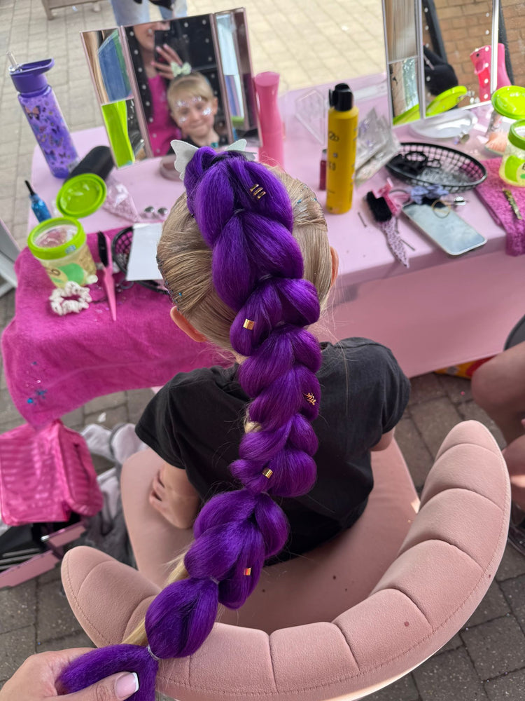 Glitter braids by The Glitter Braid Bar at the Tom Parker charity event at Bromley Football Club