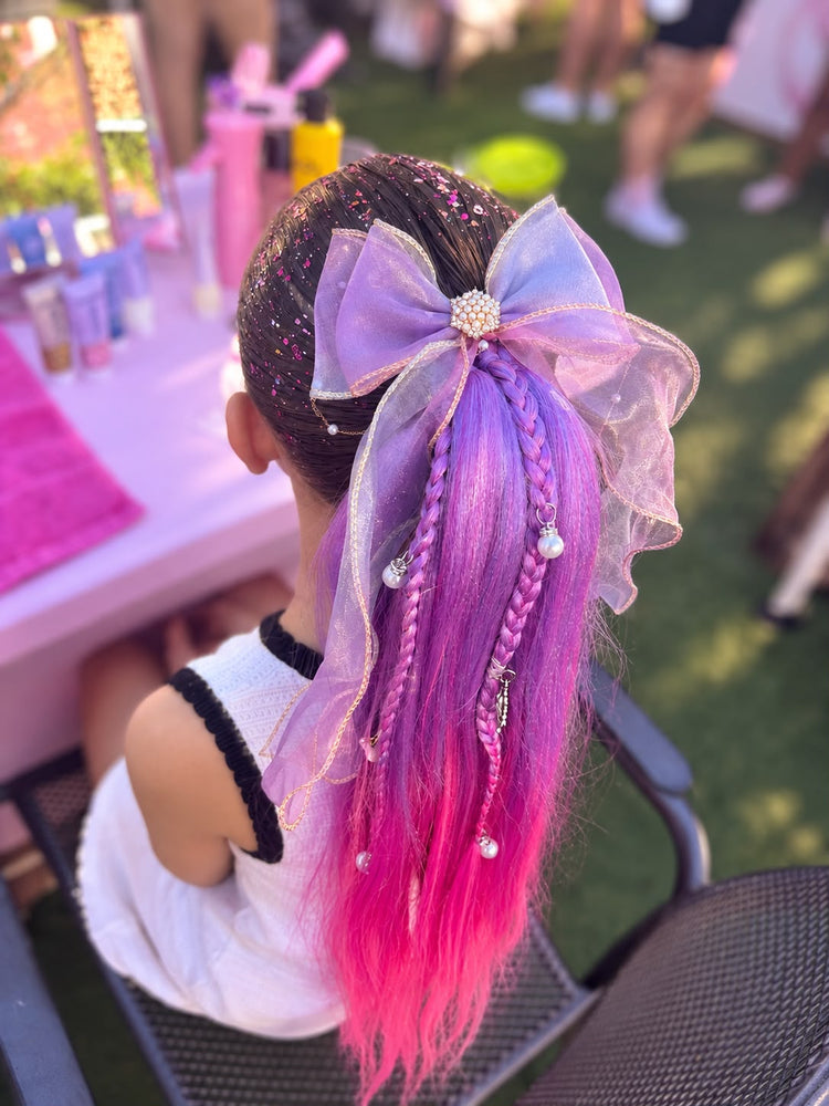 Children with glitter braids at a Glitter Braid Bar party