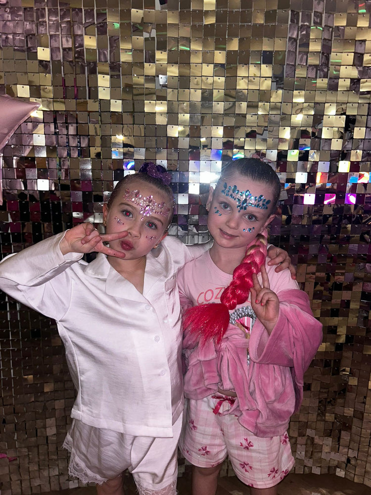 Children with glitter braids at a Glitter Braid Bar party