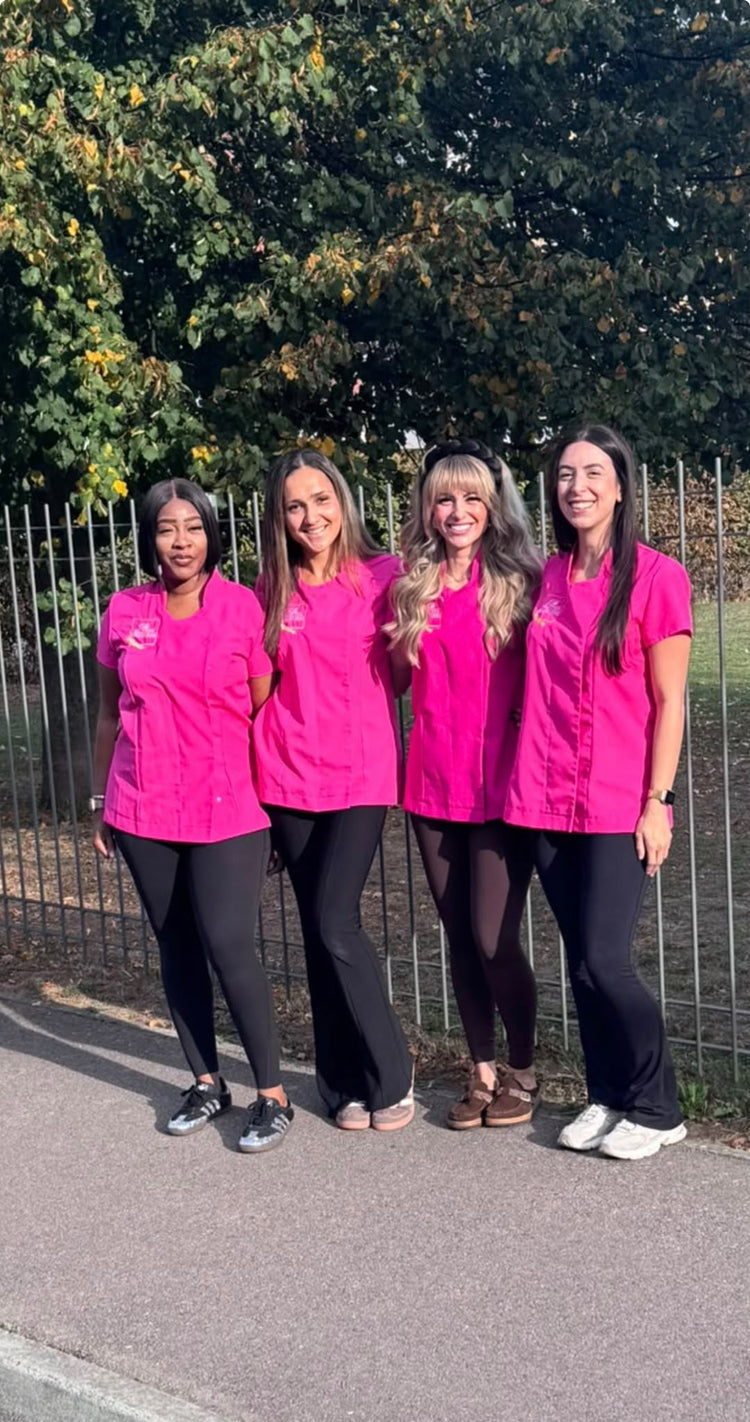 The Glitter Braid Bar team in pink uniforms at Rose's birthday party