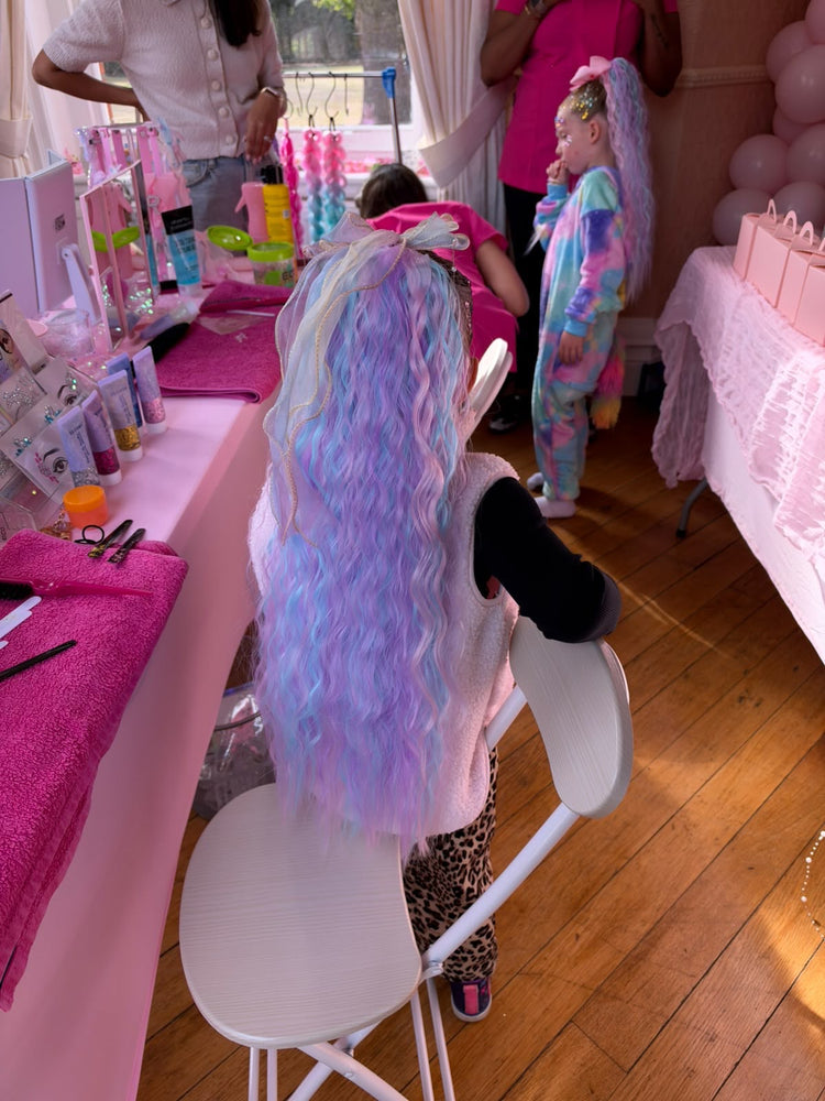 Pastel mermaid ponytail and braiding station at Rose's 5th birthday party